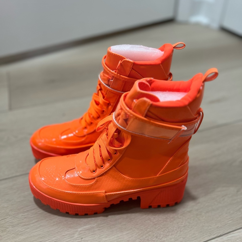 Neon orange combat boots
